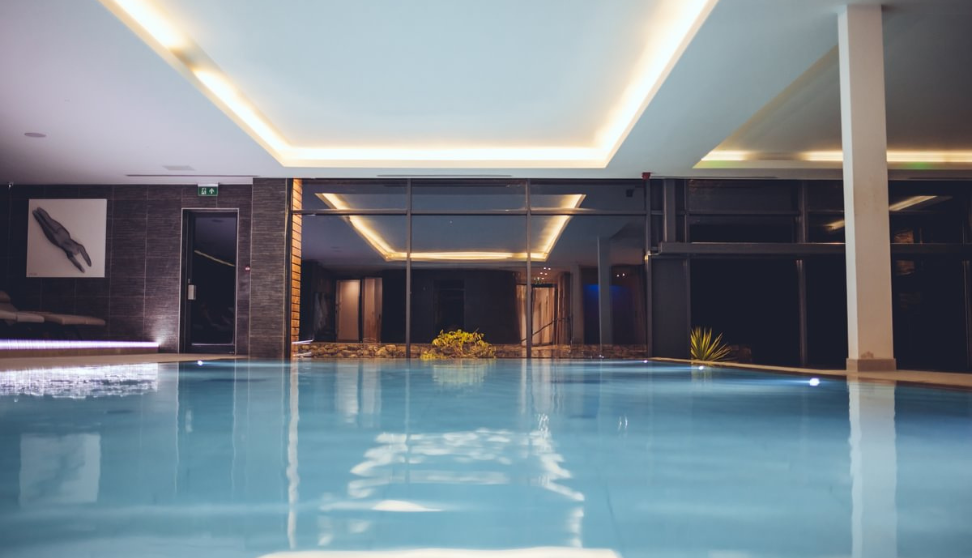 A spa, a pool of water with windows